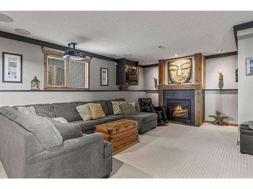 342 Hoodoo Crescent, Canmore, AB - Indoor Photo Showing Living Room With Fireplace