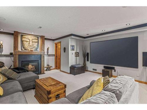 342 Hoodoo Crescent, Canmore, AB - Indoor Photo Showing Living Room With Fireplace