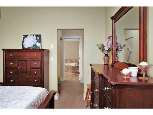 203-4707 50 Street, Sylvan Lake, AB - Indoor Photo Showing Bedroom