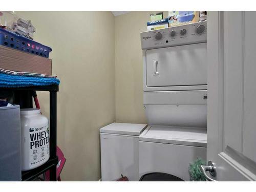 203-4707 50 Street, Sylvan Lake, AB - Indoor Photo Showing Laundry Room