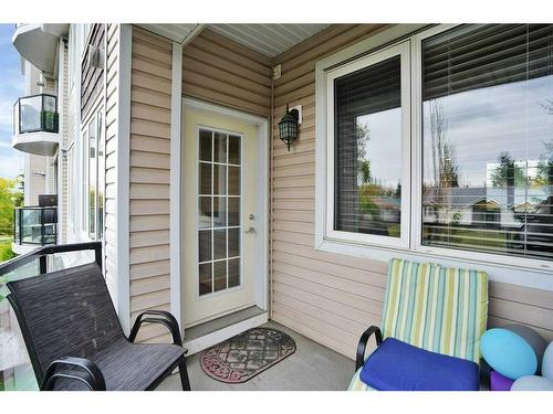 203-4707 50 Street, Sylvan Lake, AB - Outdoor With Deck Patio Veranda With Exterior