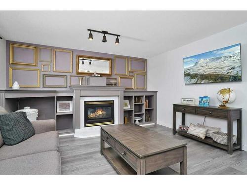 146 Robinson Crescent, Red Deer, AB - Indoor Photo Showing Living Room With Fireplace
