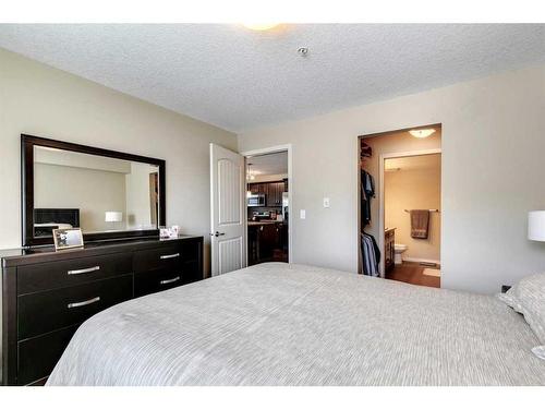1111-450 Sage Valley Drive Nw, Calgary, AB - Indoor Photo Showing Bedroom