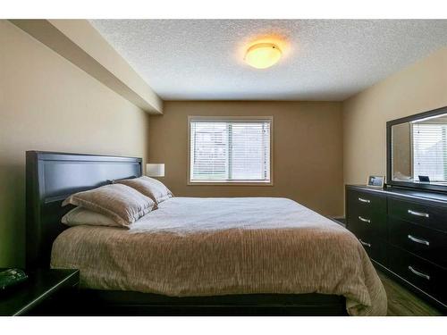 1111-450 Sage Valley Drive Nw, Calgary, AB - Indoor Photo Showing Bedroom
