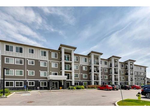 1111-450 Sage Valley Drive Nw, Calgary, AB - Outdoor With Facade