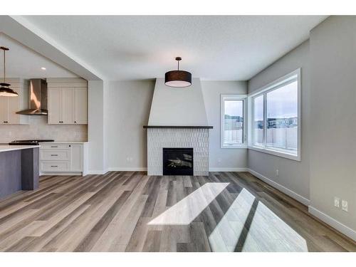 847 Bayview Terrace Sw, Airdrie, AB - Indoor With Fireplace