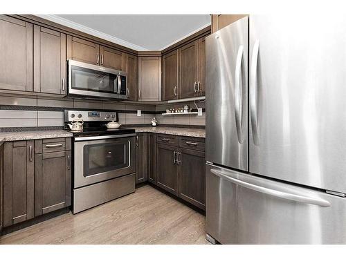 160 Lindman Avenue, Red Deer, AB - Indoor Photo Showing Kitchen With Stainless Steel Kitchen