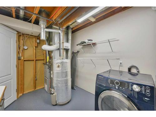75 Norris Close, Red Deer, AB - Indoor Photo Showing Laundry Room