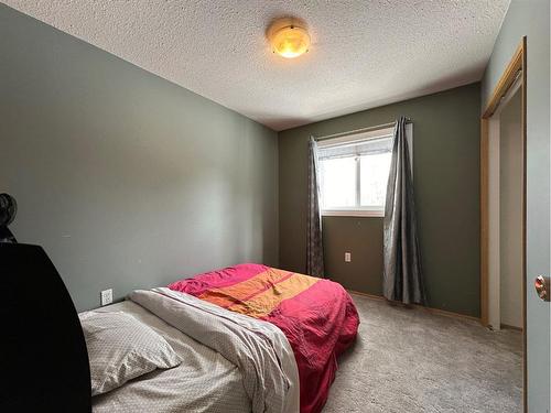64 Tawatinaw Drive, Athabasca, AB - Indoor Photo Showing Bedroom