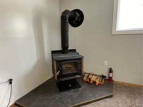 64 Tawatinaw Drive, Athabasca, AB - Indoor With Fireplace