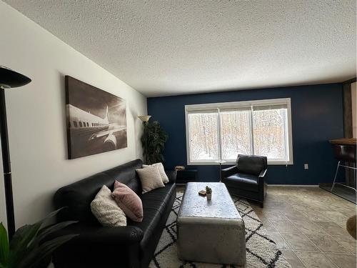 64 Tawatinaw Drive, Athabasca, AB - Indoor Photo Showing Living Room