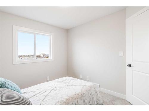 30 Valmont Street, Blackfalds, AB - Indoor Photo Showing Bedroom