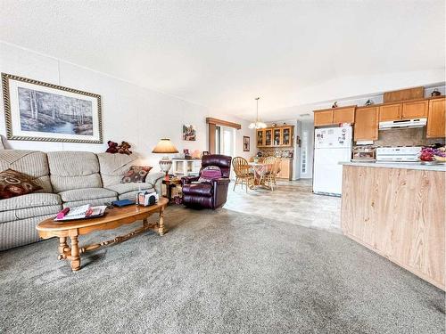 6013 53 Avenue Close, Stettler, AB - Indoor Photo Showing Living Room