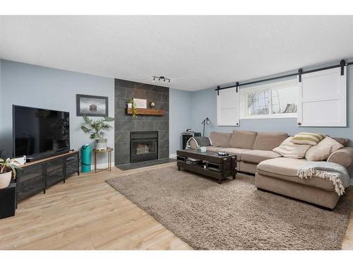 3613 Caledonia Drive, Leduc, AB - Indoor Photo Showing Living Room With Fireplace