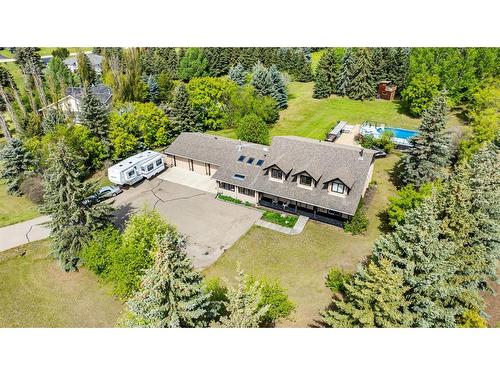 205 Wedgewood Lane, Rural Red Deer County, AB - Outdoor With Deck Patio Veranda With Facade