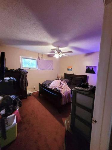 4415 48 Avenue, Sylvan Lake, AB - Indoor Photo Showing Bedroom