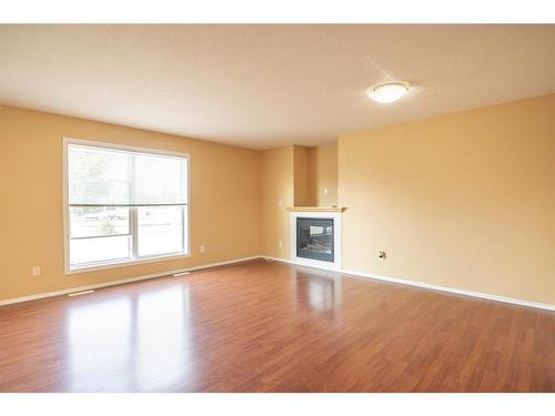 5405 60 Street, Stettler, AB - Indoor With Fireplace