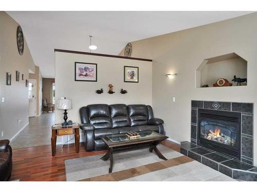 5329 Drader Crescent, Rimbey, AB - Indoor Photo Showing Living Room With Fireplace