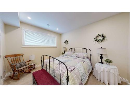 5705 54 Avenue, Stettler, AB - Indoor Photo Showing Bedroom