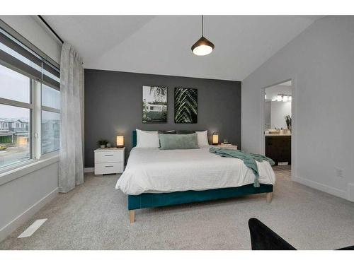 92 Heritage Hill, Cochrane, AB - Indoor Photo Showing Bedroom