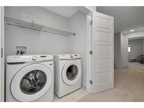92 Heritage Hill, Cochrane, AB - Indoor Photo Showing Laundry Room