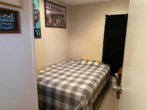 76 Parkland Drive South, Sylvan Lake, AB - Indoor Photo Showing Bedroom
