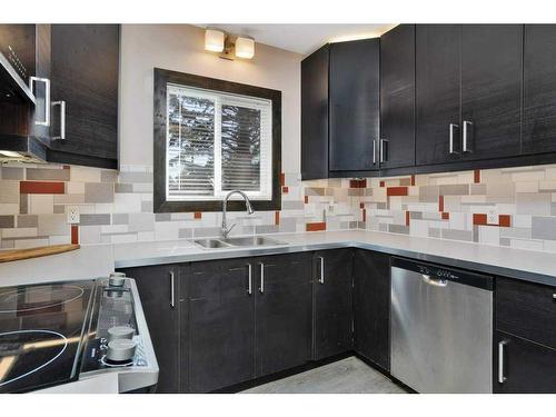 5823 51 Avenue, Stettler, AB - Indoor Photo Showing Kitchen With Double Sink