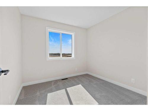 23 Gray Close, Sylvan Lake, AB - Indoor Photo Showing Other Room