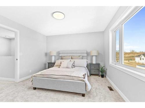 21 Gray Close, Sylvan Lake, AB - Indoor Photo Showing Bedroom