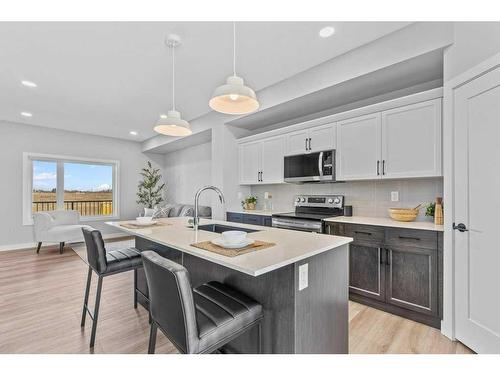 21 Gray Close, Sylvan Lake, AB - Indoor Photo Showing Kitchen With Upgraded Kitchen