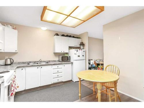 219 Overdown, Red Deer, AB - Indoor Photo Showing Kitchen With Double Sink