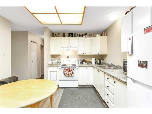 219 Overdown, Red Deer, AB - Indoor Photo Showing Kitchen With Double Sink