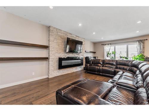 52 Talisman Close, Red Deer, AB - Indoor Photo Showing Living Room With Fireplace