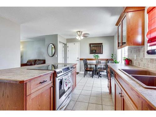 2 Macleod Close, Red Deer, AB - Indoor Photo Showing Kitchen With Double Sink
