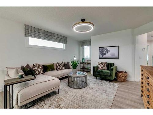 932 Langholm Drive Se, Airdrie, AB - Indoor Photo Showing Living Room