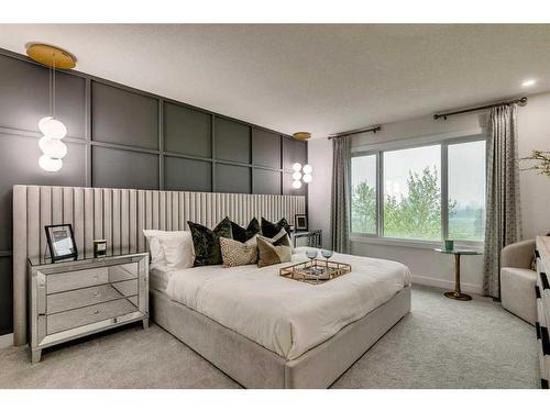 932 Langholm Drive Se, Airdrie, AB - Indoor Photo Showing Bedroom