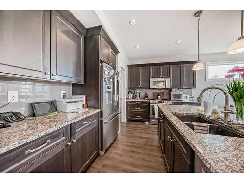 4817 39 Street, Ponoka, AB - Indoor Photo Showing Kitchen With Double Sink With Upgraded Kitchen