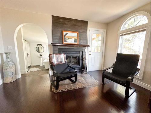 461048 Rr63, Buck Lake, AB - Indoor Photo Showing Living Room With Fireplace