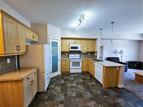 320-6 Michener Boulevard, Red Deer, AB - Indoor Photo Showing Kitchen With Double Sink