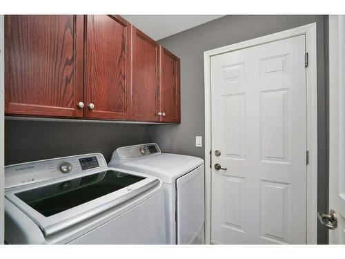 63 Lodge Place, Sylvan Lake, AB - Indoor Photo Showing Laundry Room