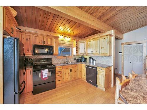 95 Grand Avenue, Norglenwold, AB - Indoor Photo Showing Kitchen With Double Sink
