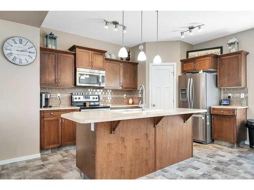 48 Brookstone Drive, Sylvan Lake, AB - Indoor Photo Showing Kitchen With Stainless Steel Kitchen