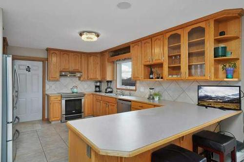 232-41124 Range Road 282, Rural Lacombe County, AB - Indoor Photo Showing Kitchen With Double Sink