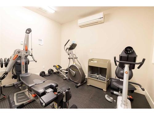 103-5901 71 Avenue, Rocky Mountain House, AB - Indoor Photo Showing Gym Room