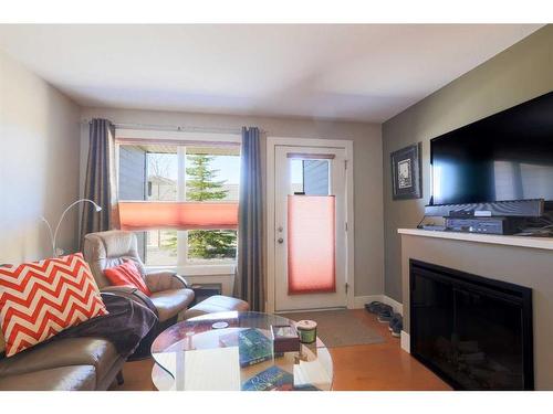 103-5901 71 Avenue, Rocky Mountain House, AB - Indoor With Fireplace