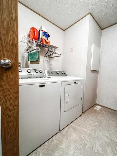 6006 54 Avenue Close, Stettler, AB - Indoor Photo Showing Laundry Room