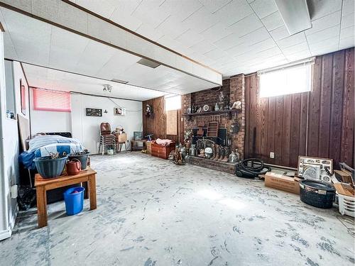 5011 72 Street, Stettler, AB - Indoor With Fireplace