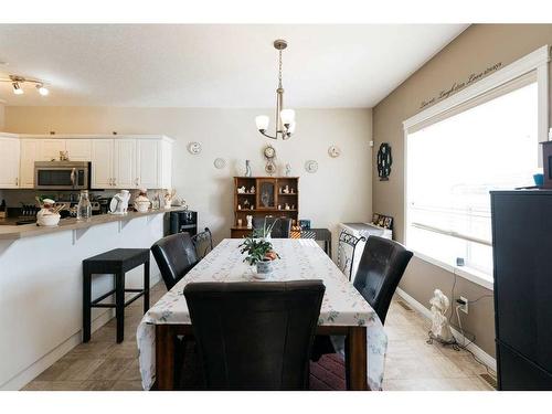 120-50 Lucky Place, Sylvan Lake, AB - Indoor Photo Showing Dining Room