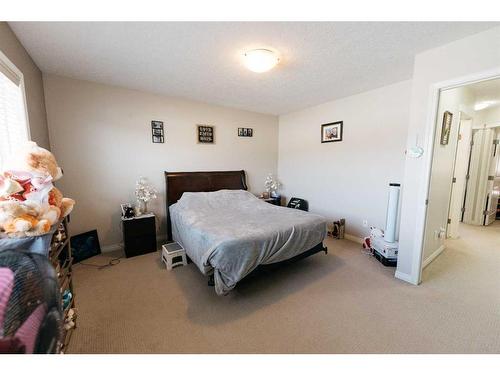 120-50 Lucky Place, Sylvan Lake, AB - Indoor Photo Showing Bedroom