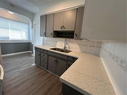 5003 56 Avenue, Ponoka, AB - Indoor Photo Showing Kitchen With Double Sink